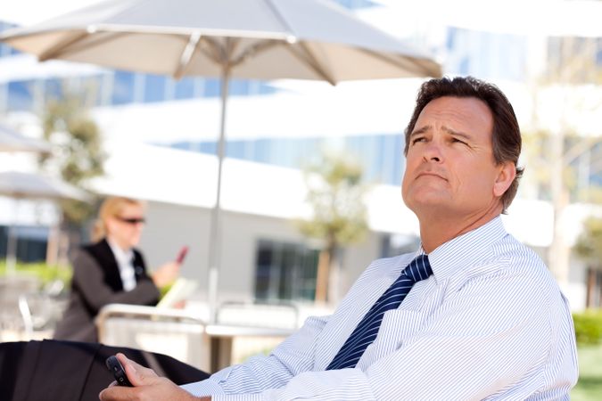 Businessman Looks Off Into the Distance