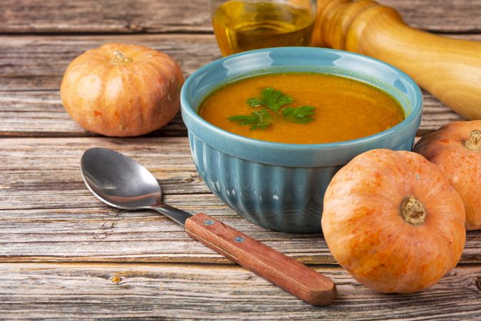 Delicious homemade pumpkin soup in bowl.