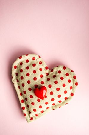 Pink pastel table with felt dotted heart ornaments