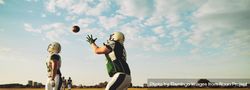 Man catches football during practice 4AMmY4