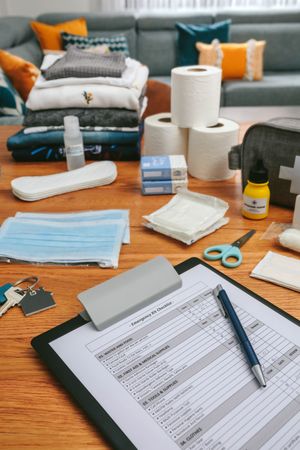 Emergency backpack checklist with necessities prepared