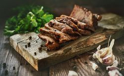 Spices near tasty fried meat