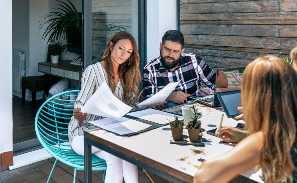 People working on the terrace of the office