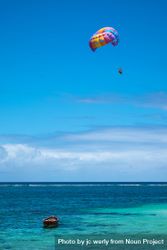 Colorful parasol shoot in the sky above Indian Ocean 4mBrWb