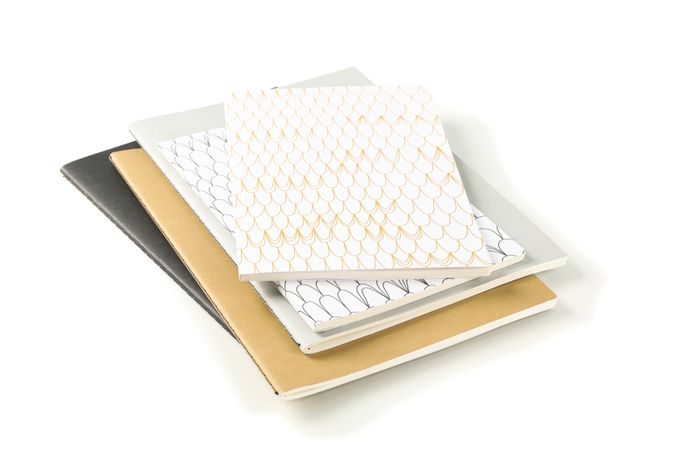 Notebooks isolated on plain background, top view
