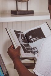 Teenage boy reading a book