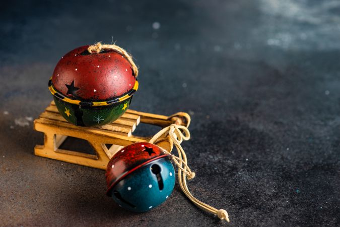 Ornamental Christmas bells on mini sleigh