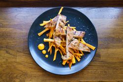 Top view of secreto iberico with potatoes
