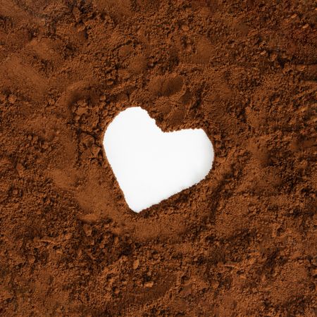 Heart shape surrounded by brown soil