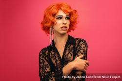 Portrait of drag queen on red background 0yPOjb