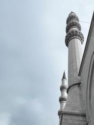 Minaret in overcast sky