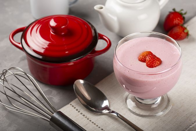 Delicious strawberry mousse in glass goblet.