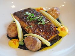 Delicious fish in plate in restaurant