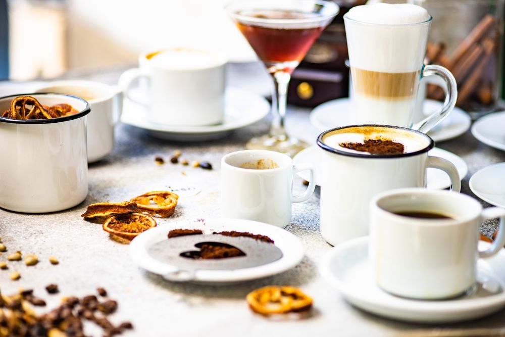 Side view of variety of coffee drinks