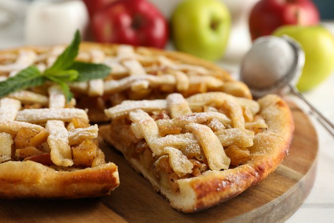 Tasty apple pie on wooden background, close up. Homemade food