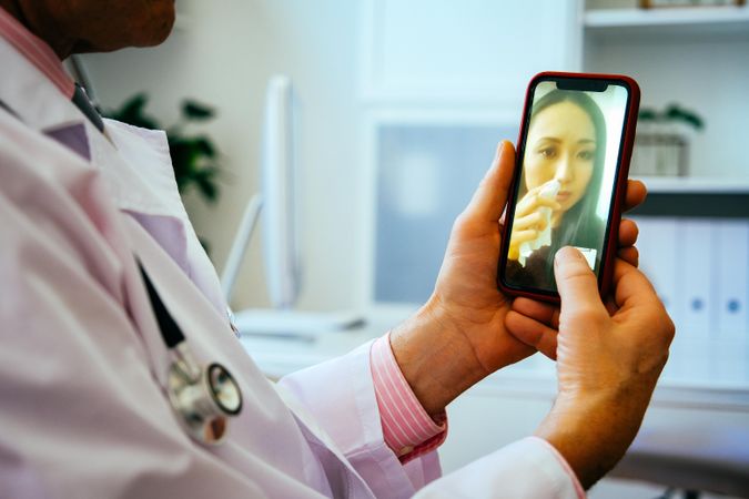 Sad patient on video call with doctor