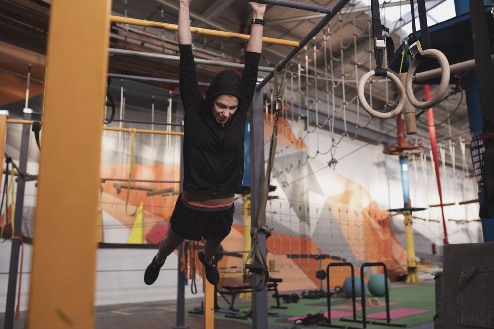 Athletic woman training in gym