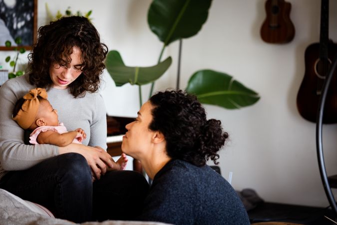 Two new moms at home with newborn