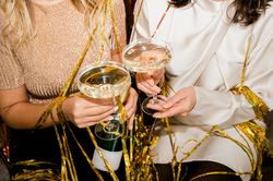 crop of woman at Party Making Champagne Toast Together