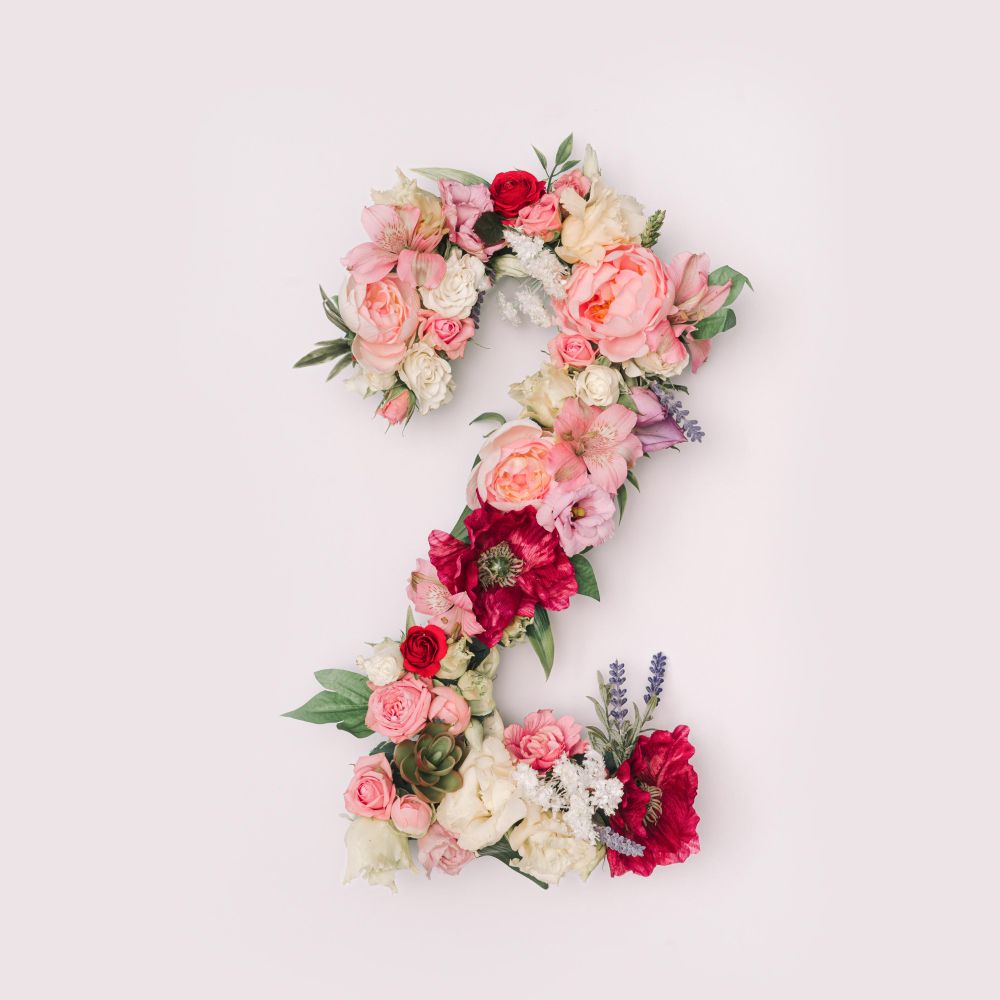 Number 2 made of real natural flowers and leaves