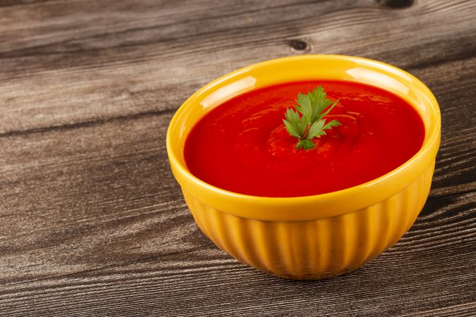 Delicious homemade tomato soup in bowl.