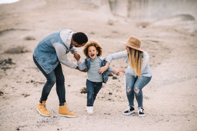 Happy multiethnic family gathering on nature