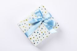 Beautiful gift box with bow on blank background, space for text