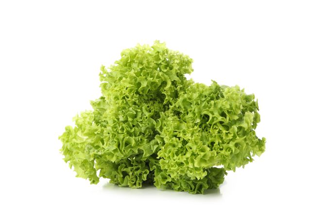Leaves of green salad isolated on blank background