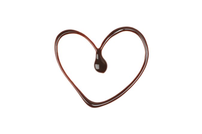 Heart made of melted chocolate isolated on blank background