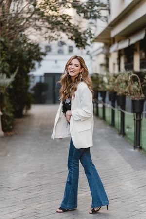 Charming woman posing on street