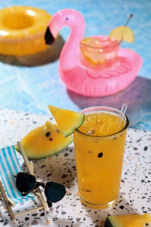 Yellow Watermelon Juice Beside teh Pool
