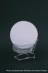 Shopping cart with circular box on dark background bYKld5