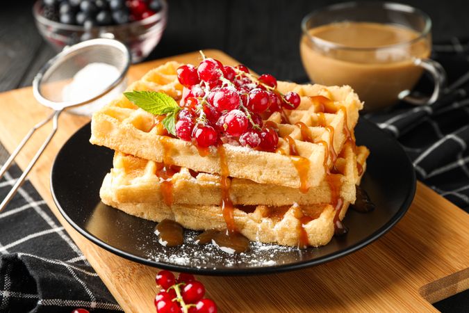 Beautiful composition with sweet waffles, closeup