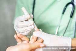 Nurse pinching a patient's finger 4dkmN5