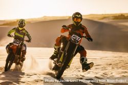 Riders racing in desert 5ln67b