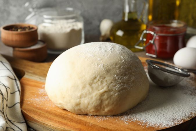 Concept for cooking pizza with ingredients and dough