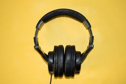 Headphones on yellow background
