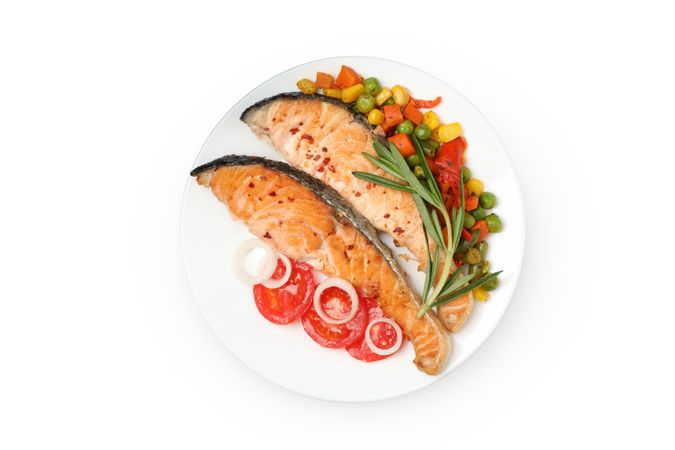 Plate with grilled salmon isolated on blank background