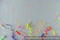Confetti and colorful streamings on grey background 43w2R4
