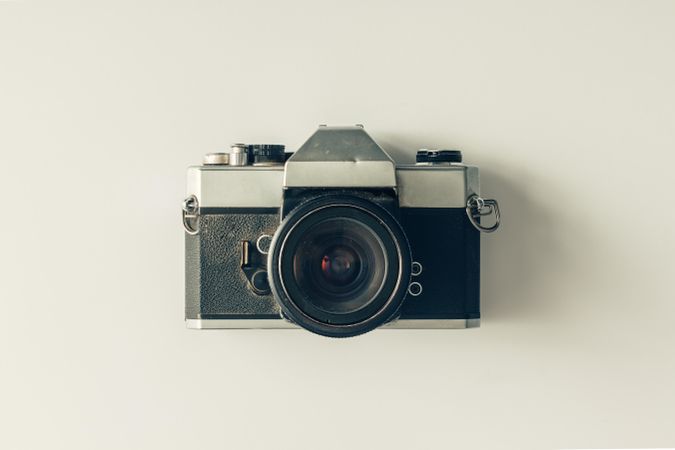 Vintage camera on light background
