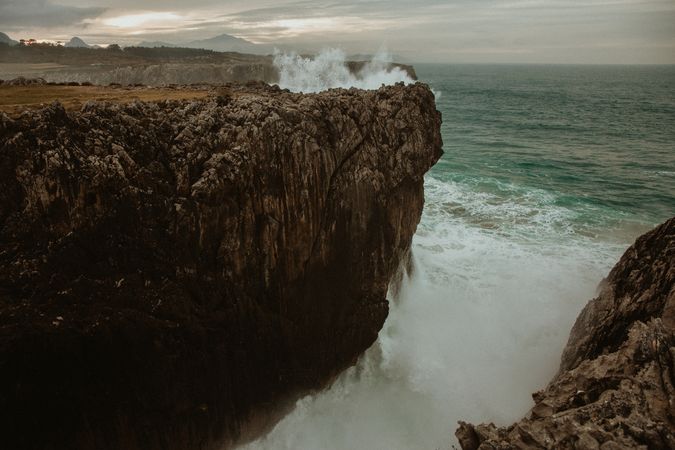 edge of cliff near water