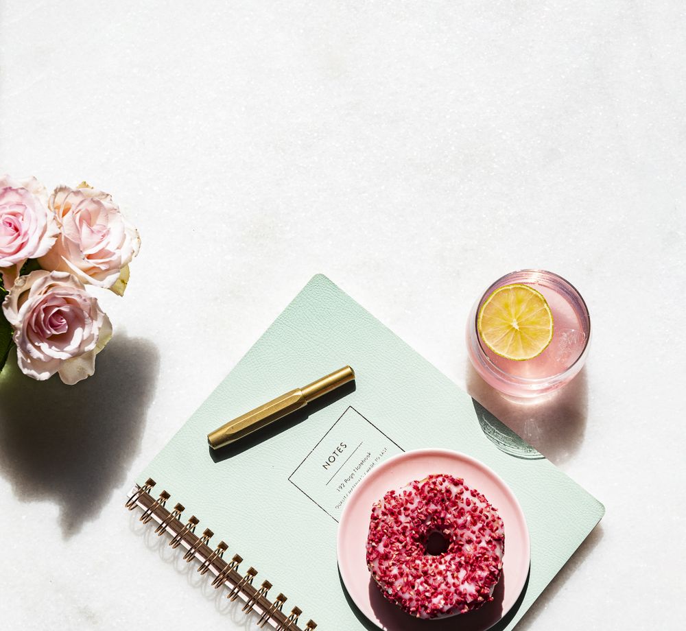 Summer office desk stationery and soda flat lay on light marble