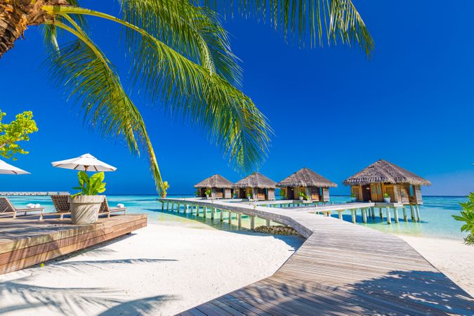 Walkway to holidays villas in the Maldives