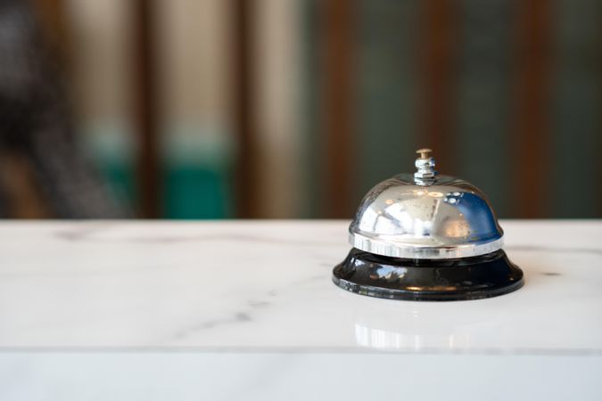 Service bell on marble counter