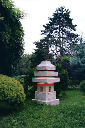 Stone red lantern in Japanese garden.