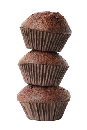 Delicious chocolate muffins isolated on blank background