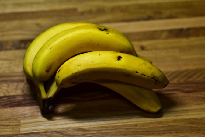 Yellow banana on a wooden table.