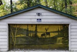 No Hunting sign on garage in McGregor, Minnesota