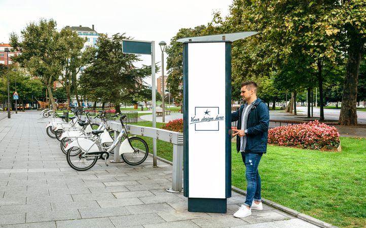 Man renting bicycle in a customizable post