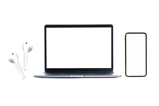 Laptop, smartphone, and earbuds on a white background